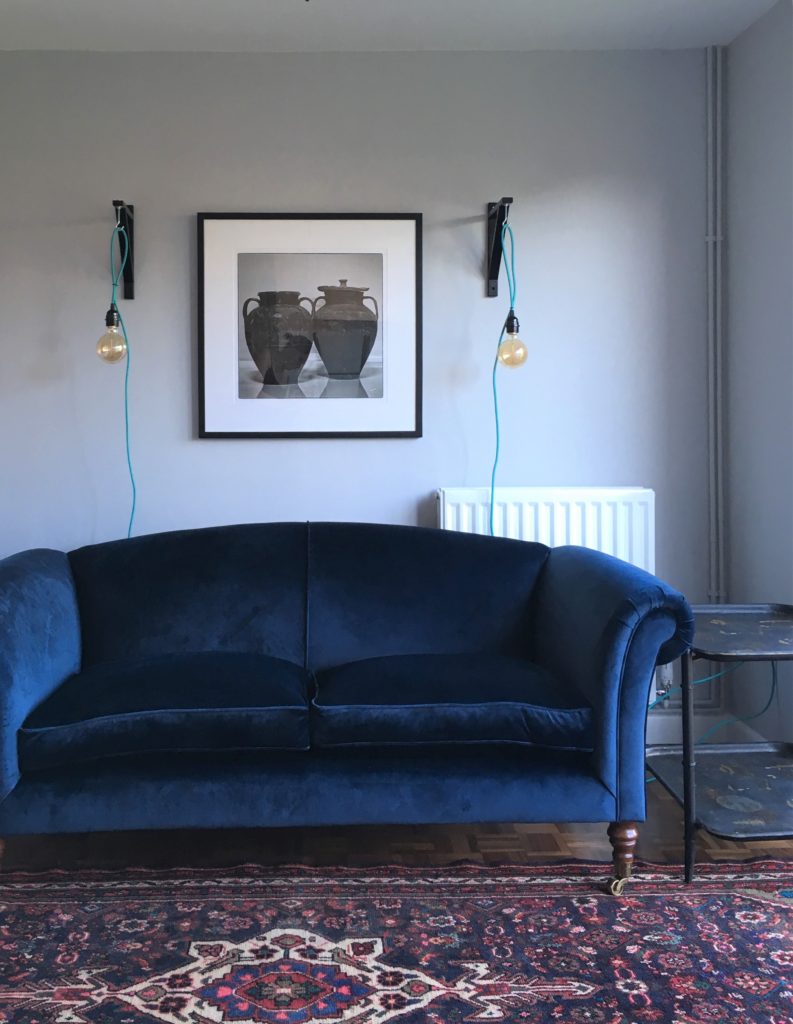 Blue velvet sofa