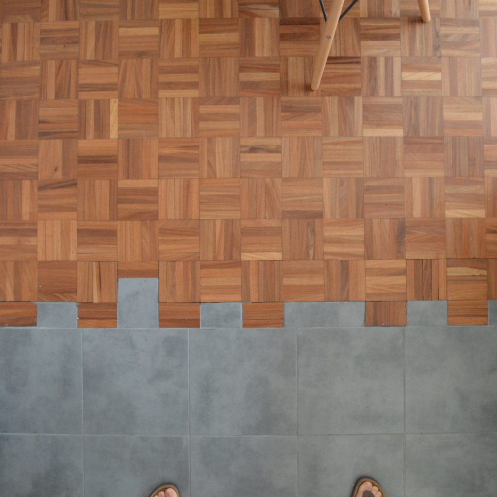 Floor transition wood parquet to tiles